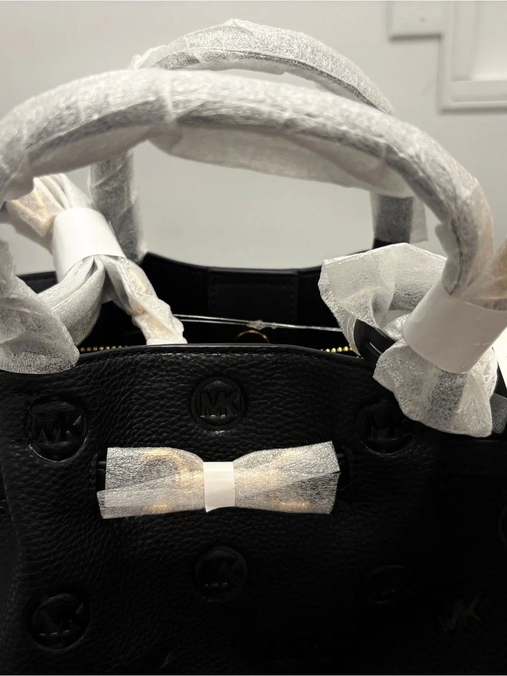 Michael Kors Carson Medium Debossed Satchel.